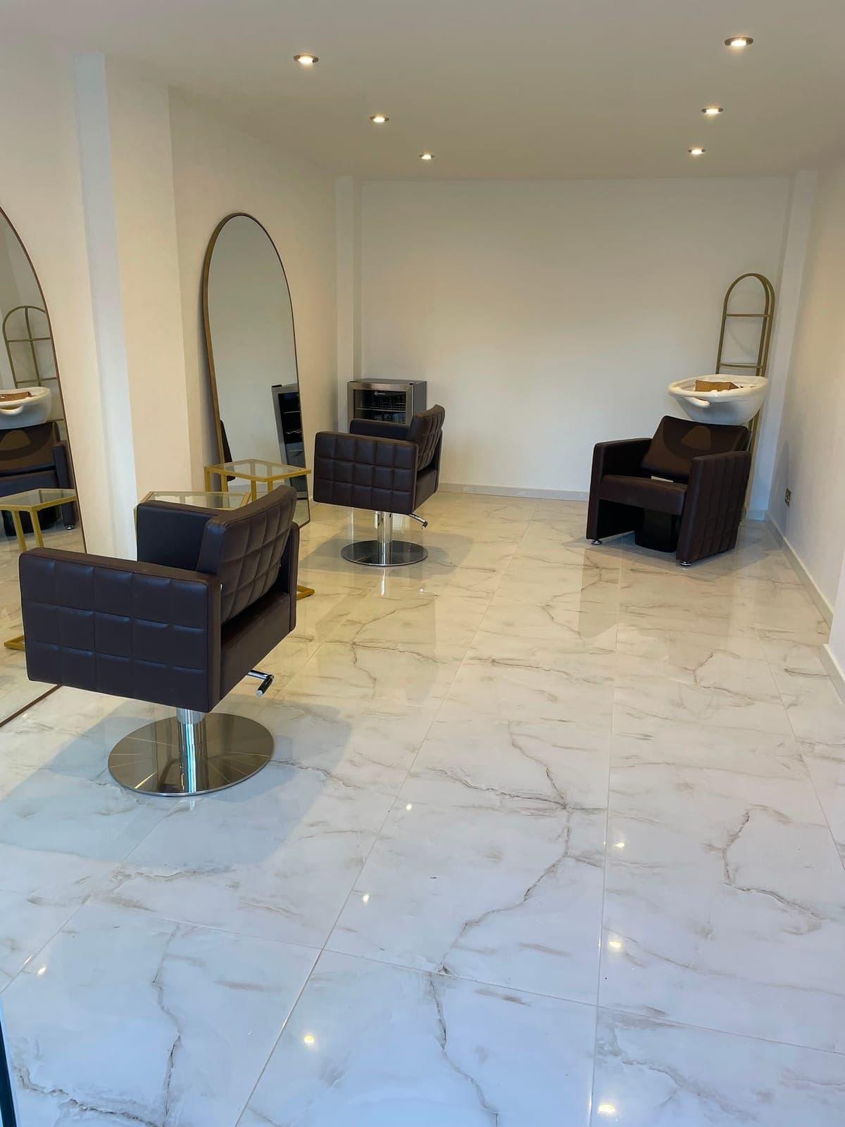 Salon Fit-Out — Commercial salon fit-out with marble-effect porcelain tiled flooring.