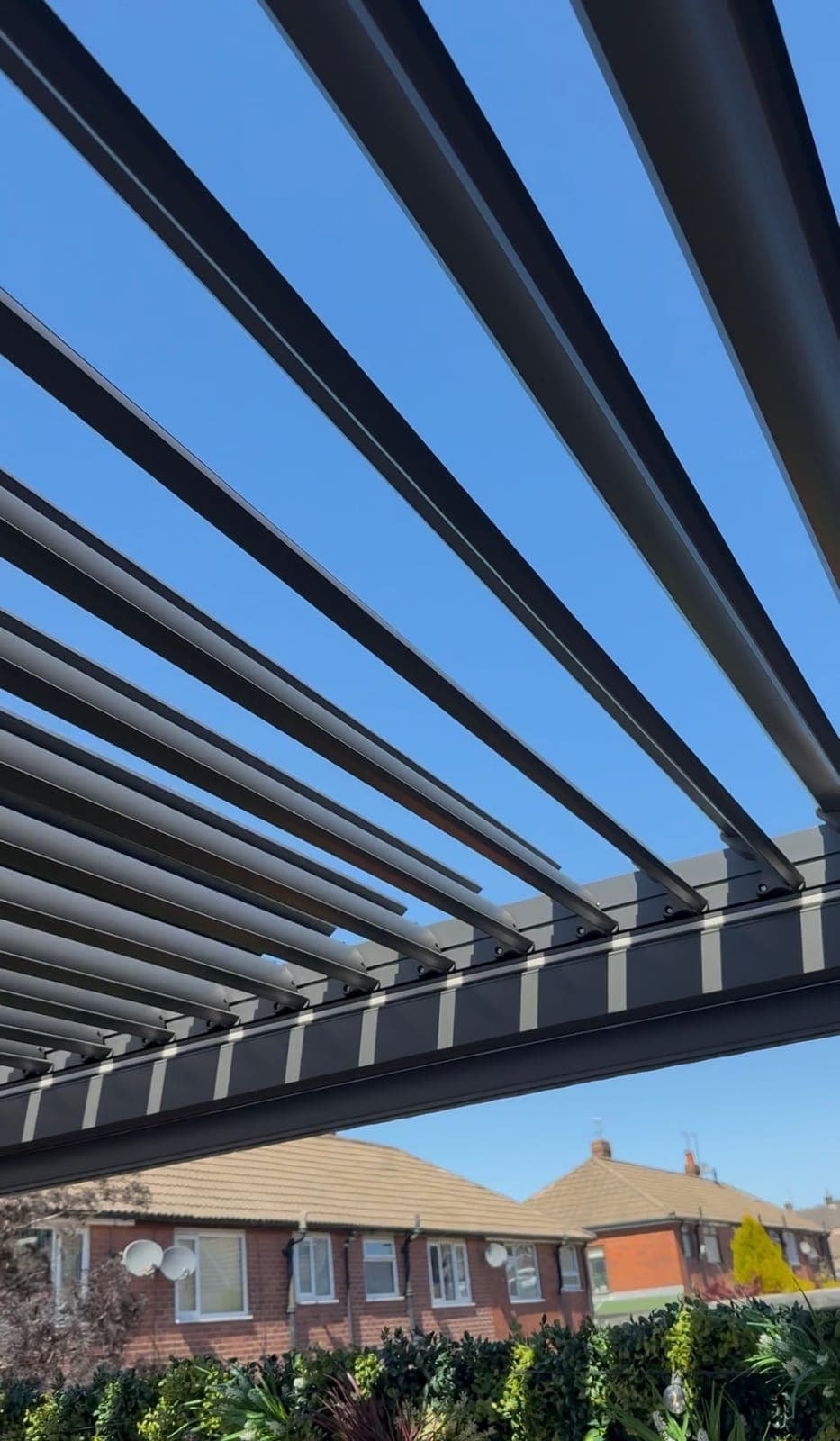 Louvered Roof Detail — Close-up of the adjustable louvered roof slats.